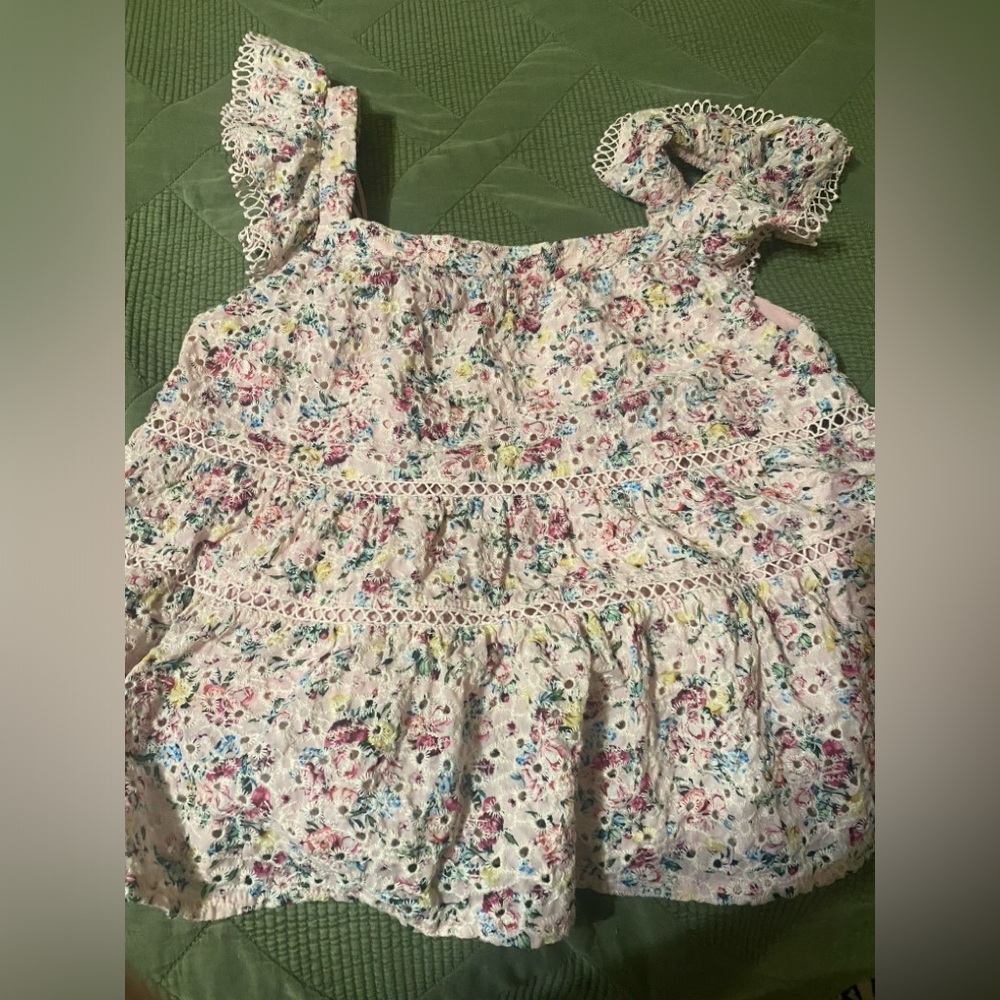 Pink floral peplum top